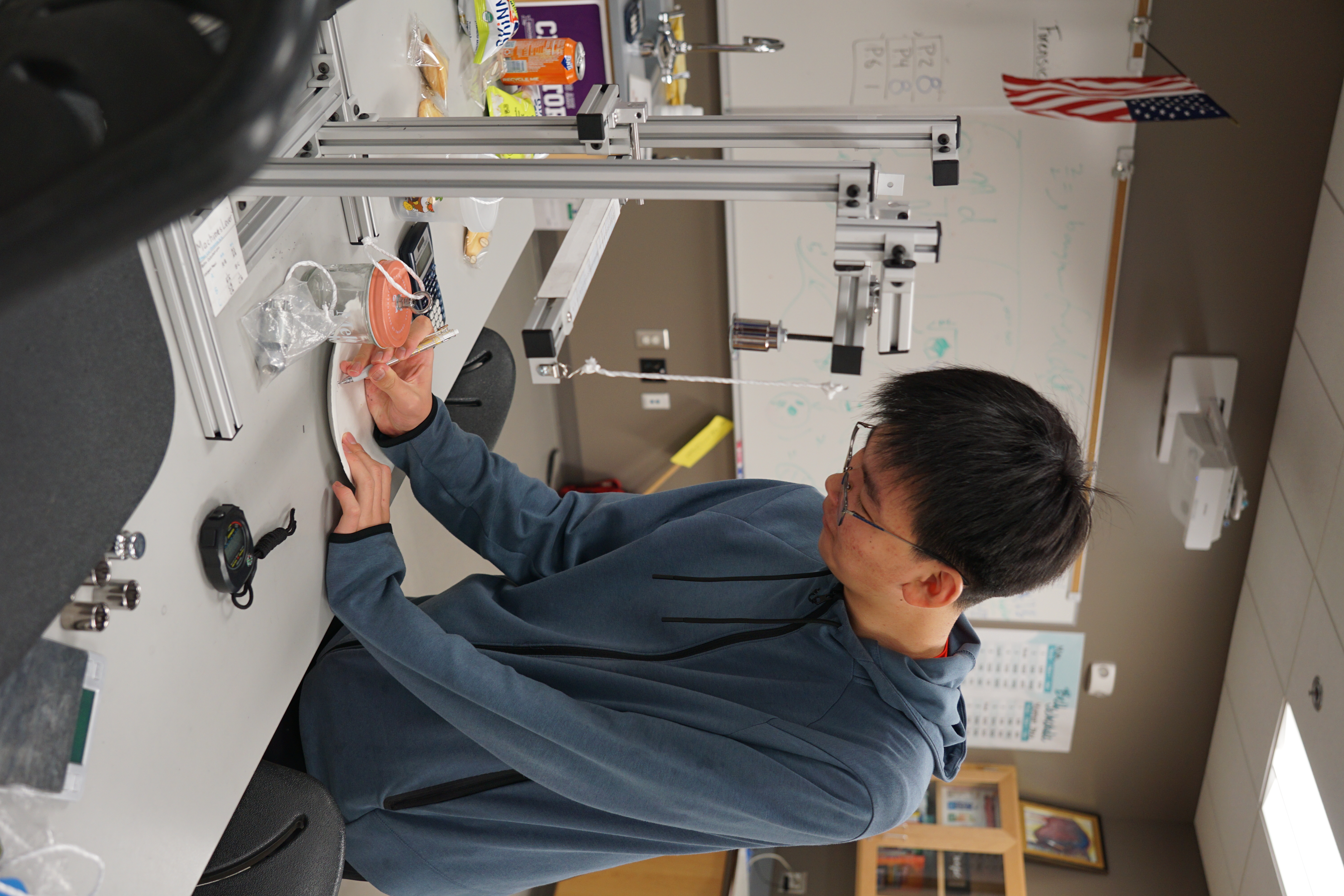 Ethan L. prepping for machines